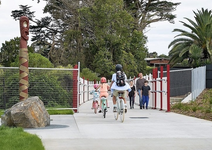 People biking Waterview shared path
