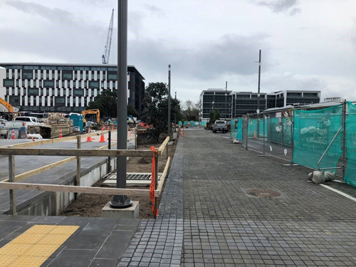Image: A view of Daldy Street north from the Pakenham Street west intersection. The cobblestones which form the new road surface have been laid and the remaining street furniture is being installed.