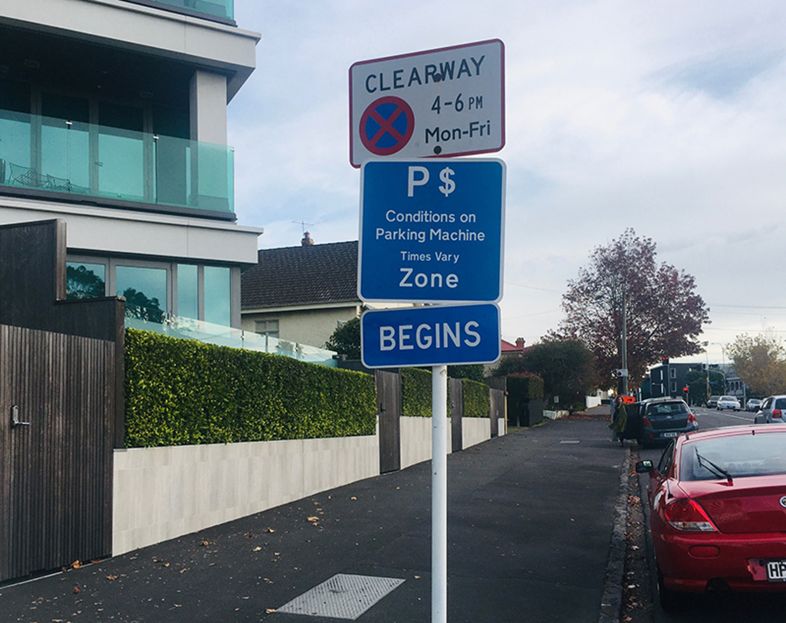 A parking sign on the street in Auckland.