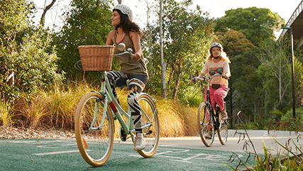cyclist riding along cycle path