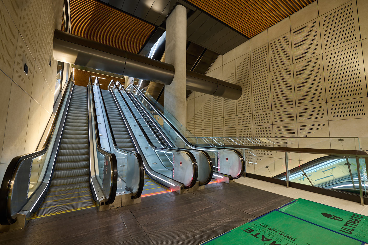 The escalators inside Karanga-a-Hape Station.