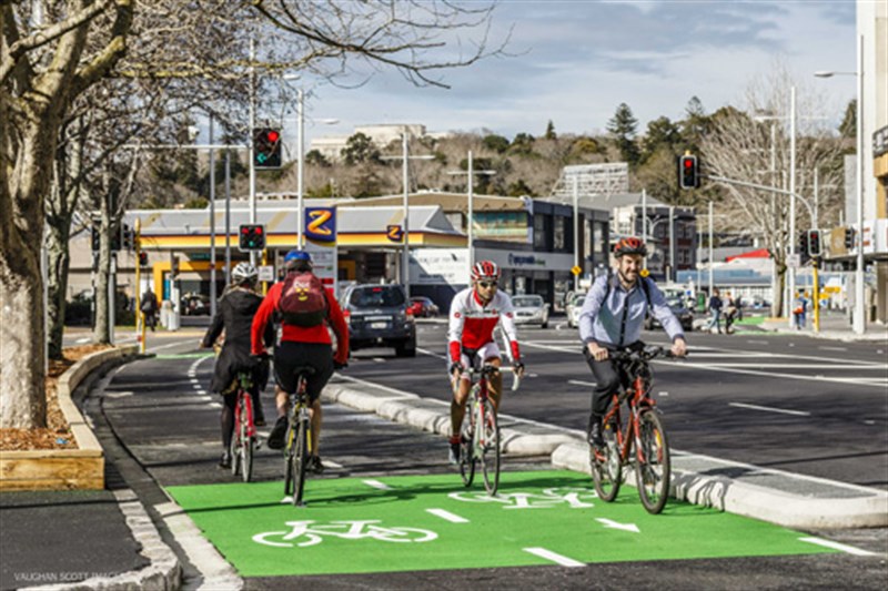 Commuter and sport cyclist on the Beach Road cycleway