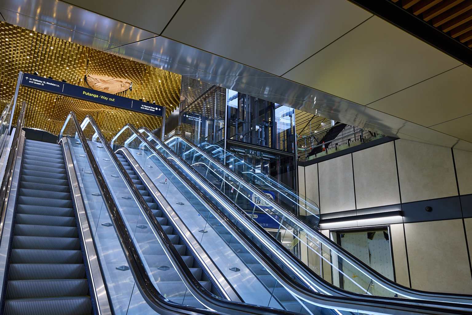 Photograph showing escalators inside Te Waihorotiu Station