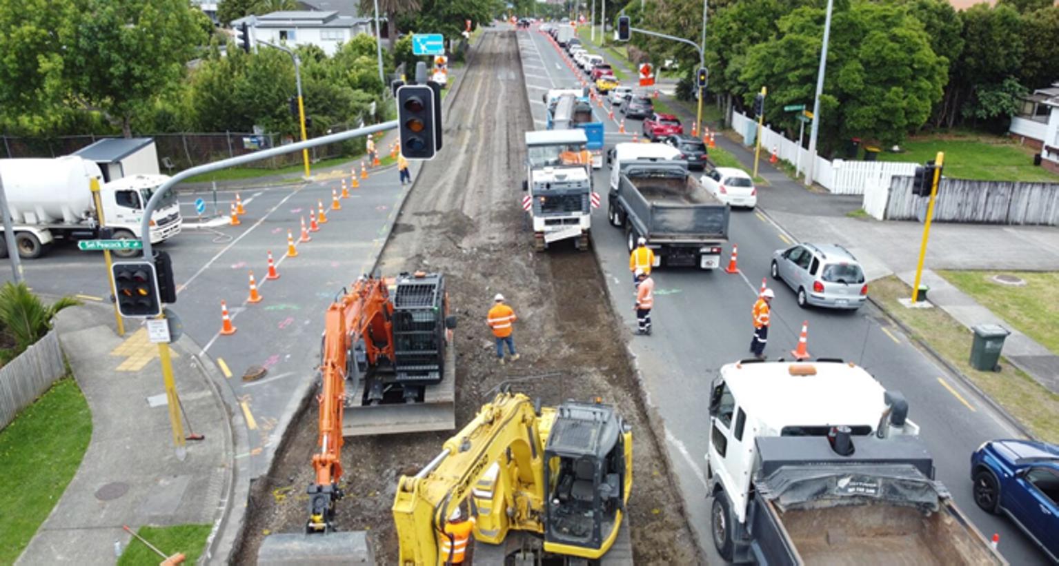 Traffic light signals being repaired.