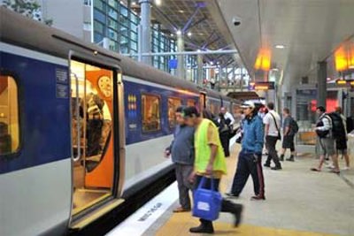 Commuters boarding the train at Britomart