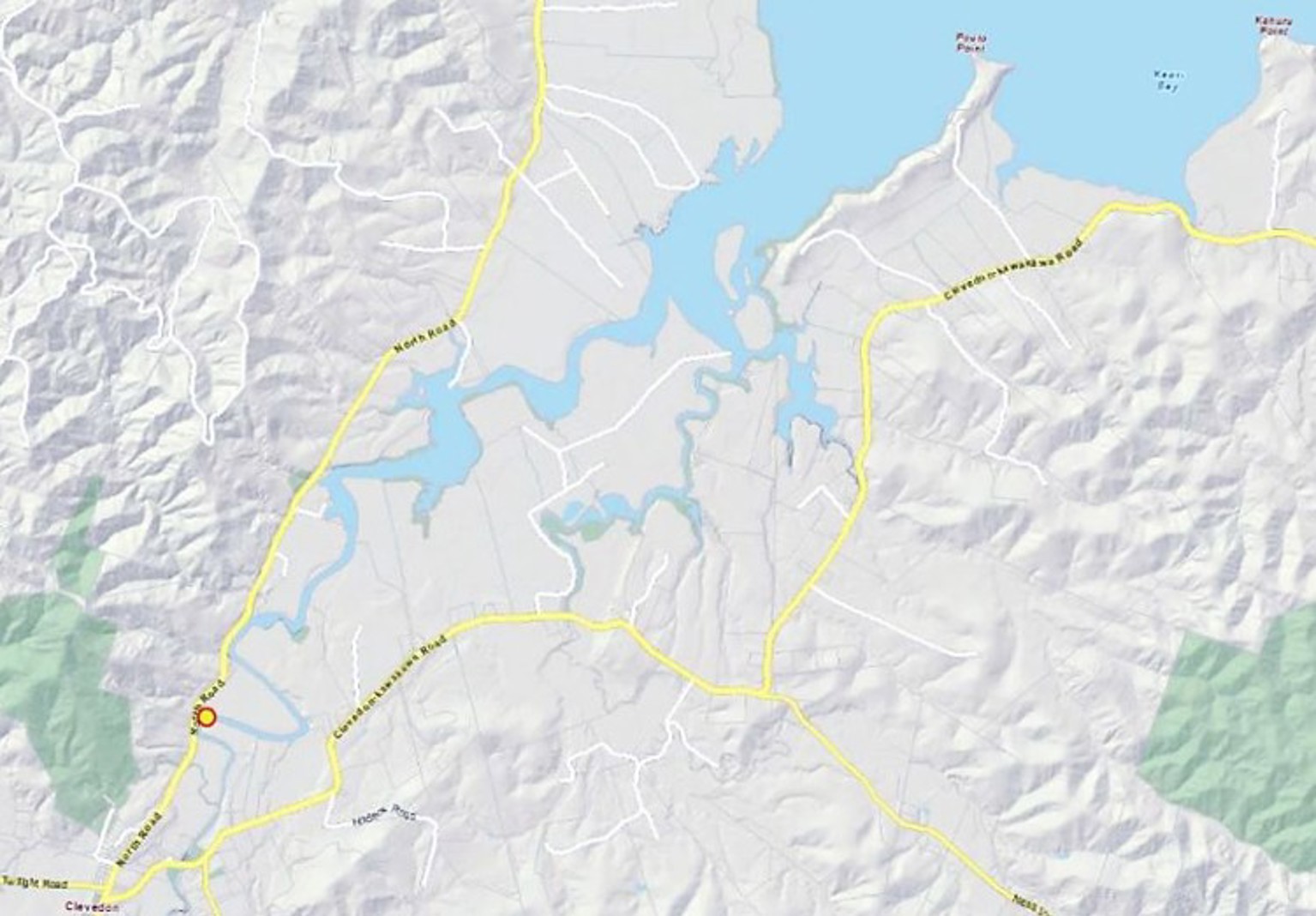 Map near Clevedon showing a red‑circled location beside a main road close to the upper reaches of the Wairoa River.