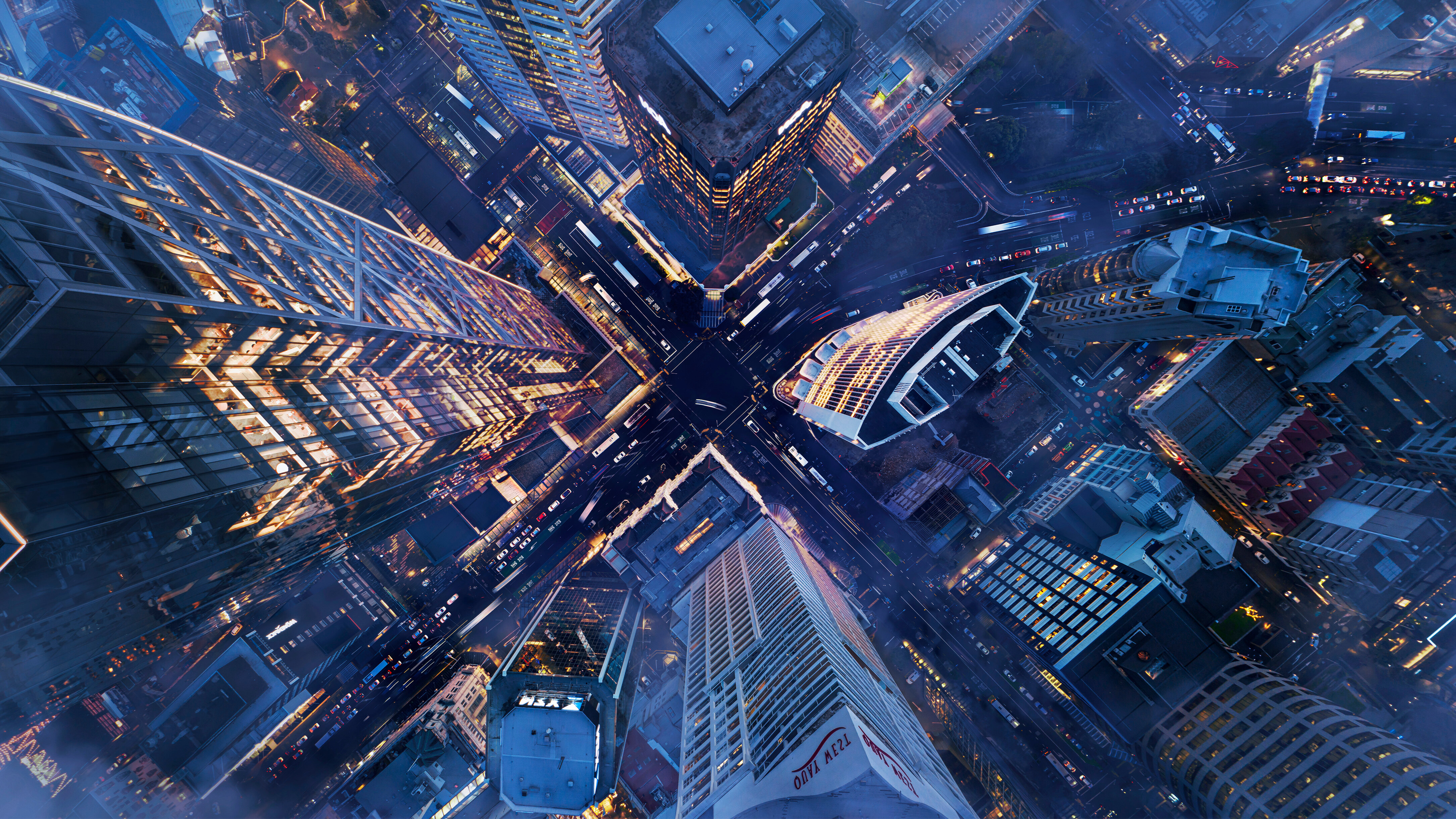 An aerial shot of a brightly lit city centre.