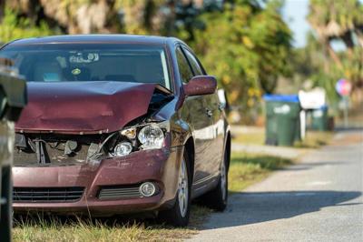 Abandoned Car With Damaged Bonnet