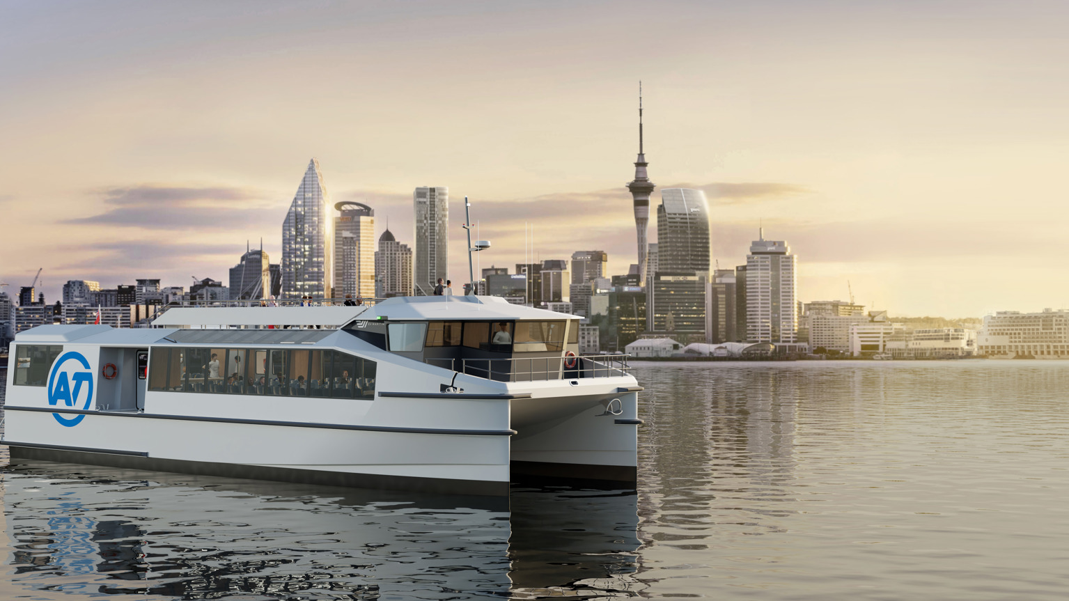 Image of electric ferry with AT logo sailing past the Auckland city landscape, including Sky Tower